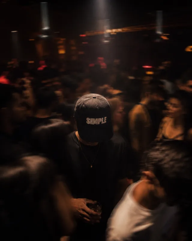 Community fit — cap detail at the venue